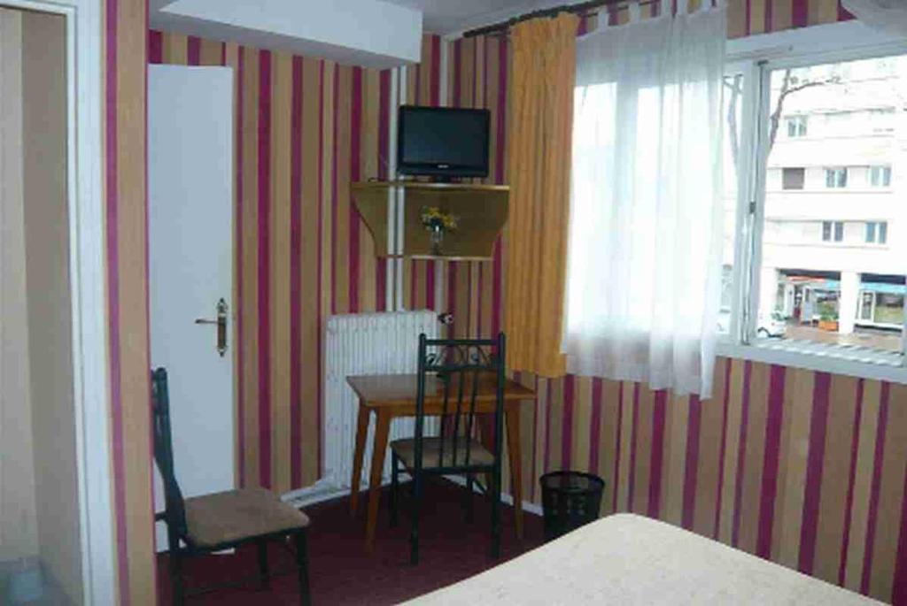 Central Hotel Caen Habitación foto